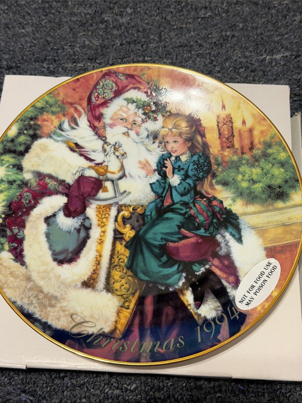 1994 Avon Christmas Decorative Plate with 22K gold rim.
